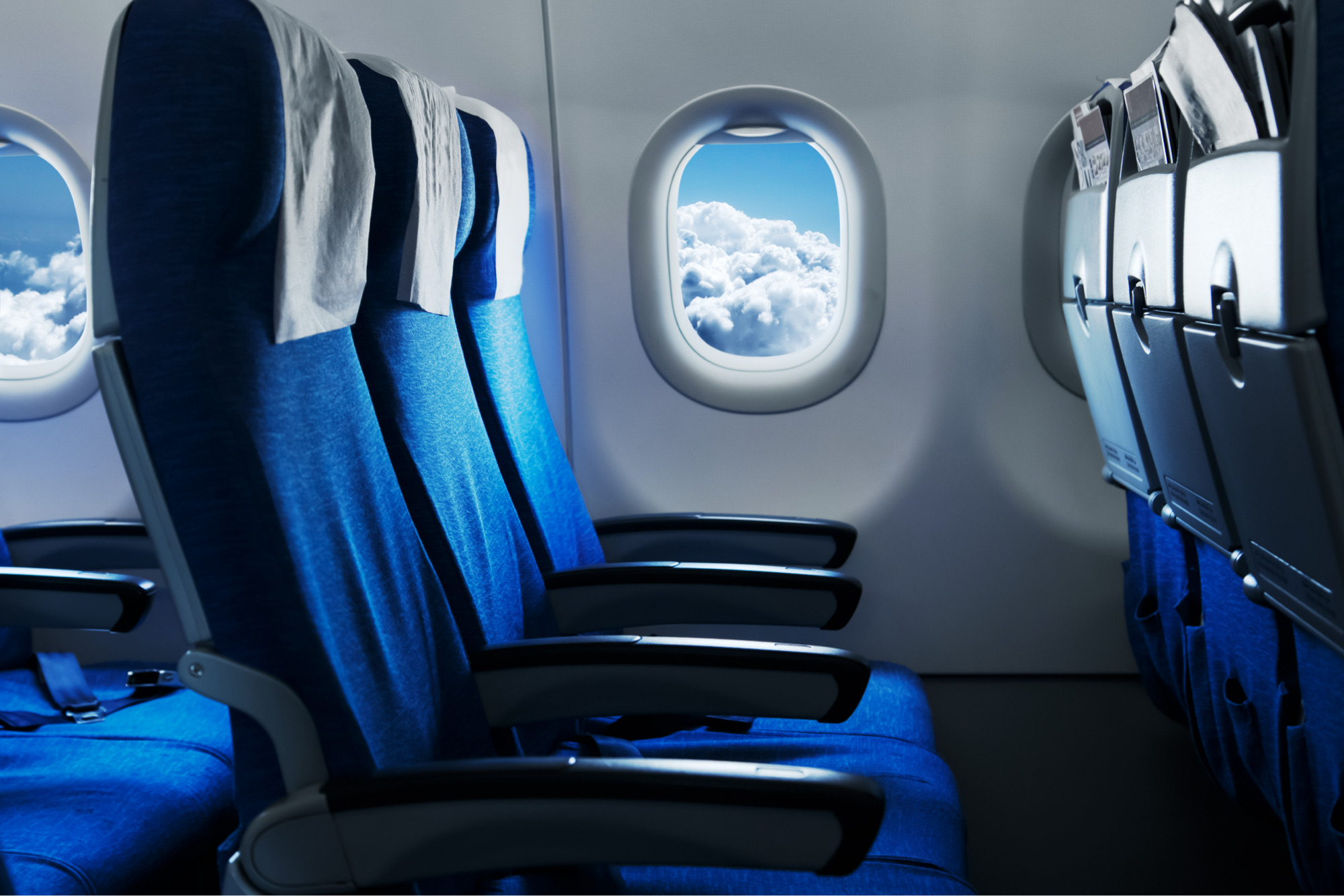 Photo of airplane seats with a window